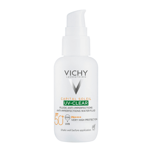 Vichy Capital Soleil UV-Clear SPF 50+ water fluid in a white pump bottle with a green and orange label, on a solid white background.